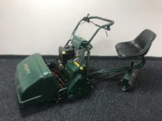 An Atco Royale 24E I-C petrol sit-on cylinder lawn mower,