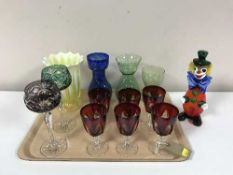 A tray of assorted glass ware - Murano clown, wine glasses, vaseline glass vase,