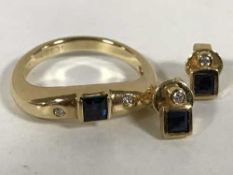 An 18ct gold sapphire and diamond set ring,