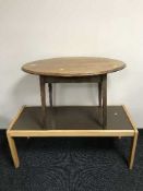 A beech coffee table together with an oval mahogany occasional table