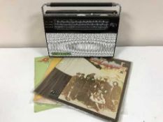 A box of assorted radios and LP records, a record case of LP records - Led Zepplin, The Doors,