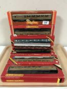 A tray of seven boxed Hornby OO gauge railway carriages and one un-boxed