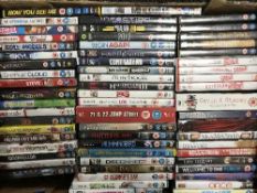 Three boxes of CDs and DVDs