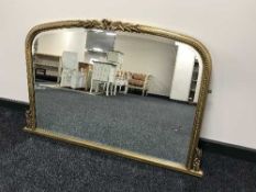 A gilt framed over mantel mirror