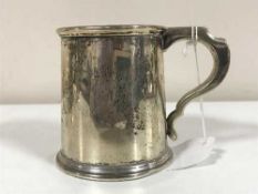 A silver mug,