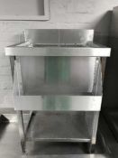 A stainless steel ice hopper