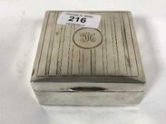 A silver cigarette box