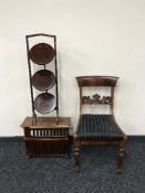 A mahogany brass inlay mag rack,