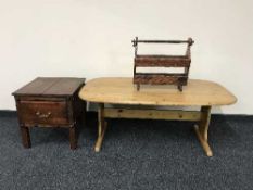 An oval pine coffee table,