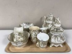 A tray of Victorian twenty-three piece cream and gilt tea service