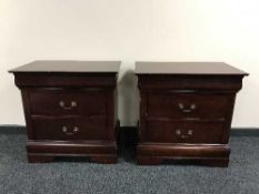 A pair of stained pine bed side chests