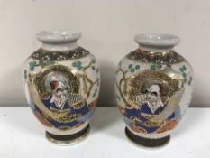 A pair of 20th century Japanese earthenware vases
