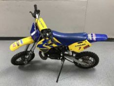 A child's Husqvarna motor bike