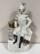 A Staffordshire flat back figure of Emperor Napoleon