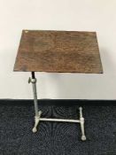 An oak folding bed table