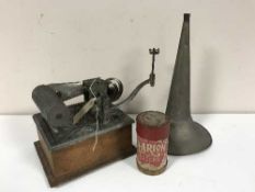 An Edison Phonograph with winding key and horn retailed by A. C.