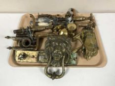 A tray of brass taps, brass door knocker,