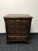 A Georgian mahogany four drawer chest