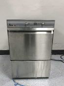 A stainless steel counter top glass washer,