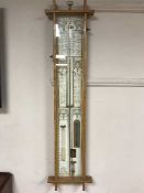 An Admiral Fitzroy's barometer in oak case