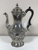 A Victorian silver hot water jug,