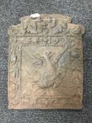 A Victorian cast iron fire back