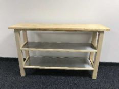 A kitchen three tier prep bench
