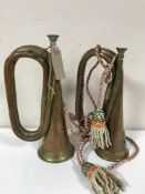 Two military copper and brass bugles