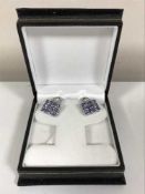 A pair of 18ct white gold tanzanite and diamond set earrings