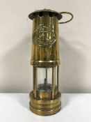 A brass Cambrian miner's lamp by E Thomas & Williams