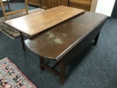 A drop leaf coffee table and one other