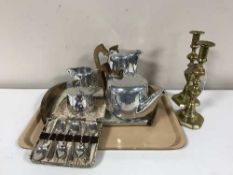 A five piece Picquot tea service and tray together with a pair of brass candlesticks and set of