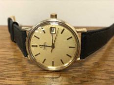A Gents 9ct gold Omega Automatic Centre Seconds Calendar wristwatch