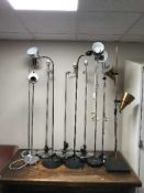 Ten assorted metal floor lamps