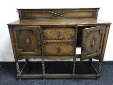 An oak barley twist sideboard