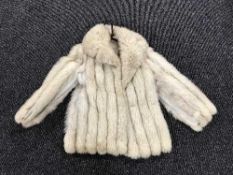 A light mink fur coat