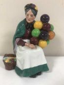 A Royal Doulton figure - The Old Balloon Seller HN 1315