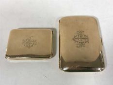 A 9ct gold cigarette case, together with a 9ct gold vesta case containing matches, 82.