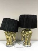 A pair of gilt elephant table lamps