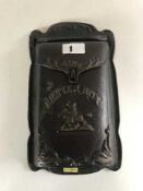 A cast metal letter box