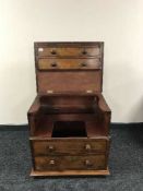 A mahogany commode in the form of a chest