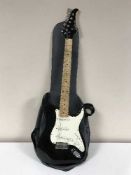 A Silvertone electric guitar in carry bag