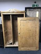 An antique stripped pine Gentleman's wardrobe