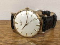 A Gents 9ct gold Longines centre seconds wristwatch
