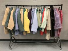 A rail of assorted lady's 1970's and later clothing - Wool capes with skirts, simulated fur coat,