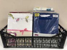 A quantity of new bedding (two boxes)