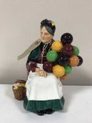 A Royal Doulton figure - The Old Balloon Seller HN 1315