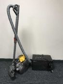 A Russell Hobbs microwave together with a Dyson cylinder vac