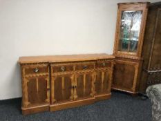 An inlaid yewwood breakfront four door sideboard with matching corner display cabinet