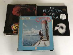 A box of LP records - ABBA, Pavarotti, Billy Joel,